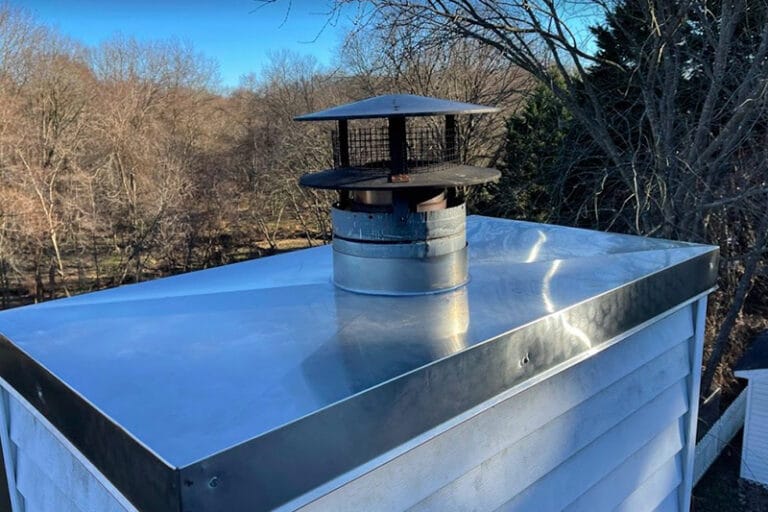 blog-chimney-crown-metal - Sweep Your Chimney chimney cap installation Rockville Maryland